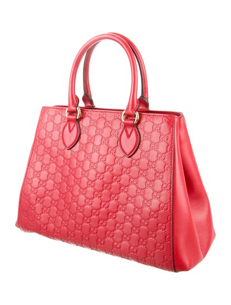 gucci signature handbag|guccissima signature bag.